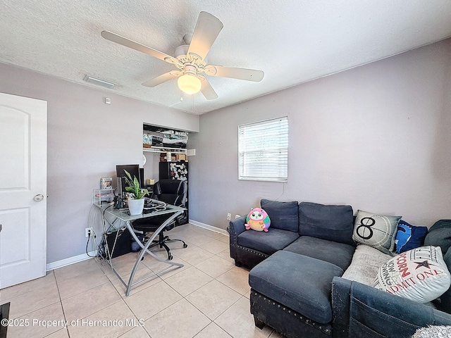 1531 NE 38th St, Ocala, FL 34479 - office featuring light tile patterned flooring, a ceiling fan, baseboards, and a textured ceiling