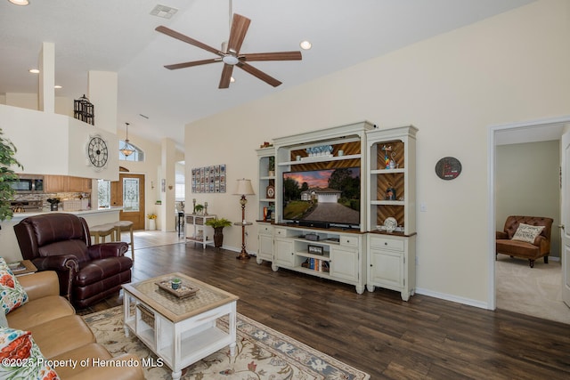 11404 Inman Ct, Spring Hill, FL 34609 - living room with a ceiling fan, dark wood-style floors, high vaulted ceiling, recessed lighting, and baseboards