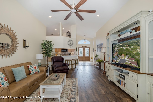 11404 Inman Ct, Spring Hill, FL 34609 - living room with ceiling fan, dark wood finished floors, and high vaulted ceiling
