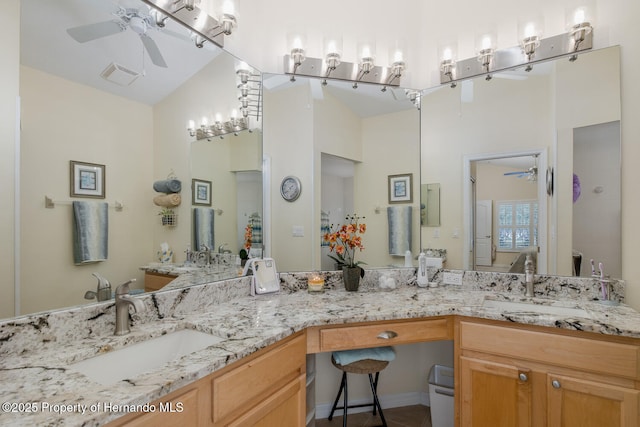 11404 Inman Ct, Spring Hill, FL 34609 - bathroom with ceiling fan, double vanity, and high vaulted ceiling
