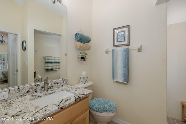 11404 Inman Ct, Spring Hill, FL 34609 - ensuite bathroom featuring toilet and vanity