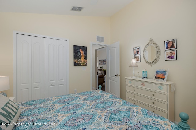 11404 Inman Ct, Spring Hill, FL 34609 - bedroom with a closet and vaulted ceiling
