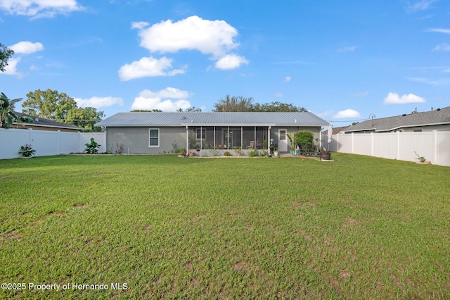 11226 Murraysville Dr, Spring Hill, FL 34609 - rear view of house featuring a sunroom and metal roof