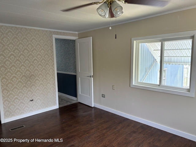 12325 Fairway Ave, Brooksville, FL 34613 - spare room featuring wood finished floors, ceiling fan, ornamental molding, and wallpapered walls