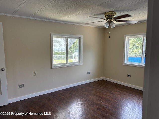 12325 Fairway Ave, Brooksville, FL 34613 - unfurnished room featuring ornamental molding, a ceiling fan, and dark wood-style floors