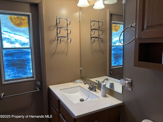 12325 Fairway Ave, Brooksville, FL 34613 - bathroom featuring vanity and plenty of natural light