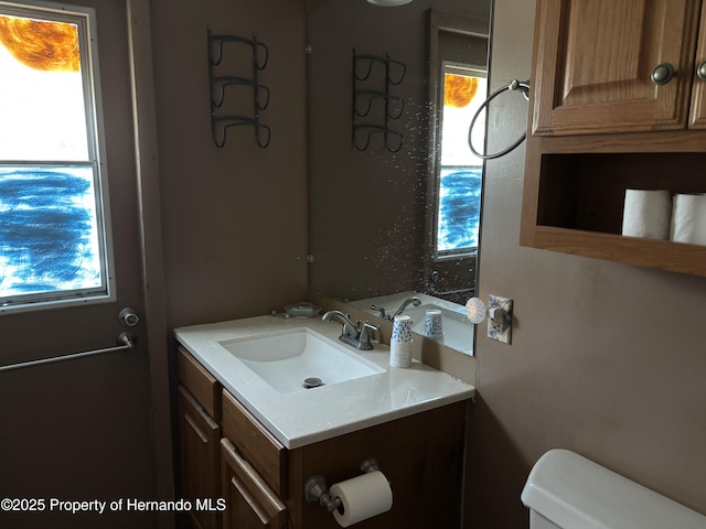 12325 Fairway Ave, Brooksville, FL 34613 - bathroom featuring healthy amount of natural light and vanity