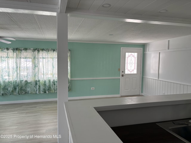12325 Fairway Ave, Brooksville, FL 34613 - foyer entrance featuring light wood finished floors and a ceiling fan