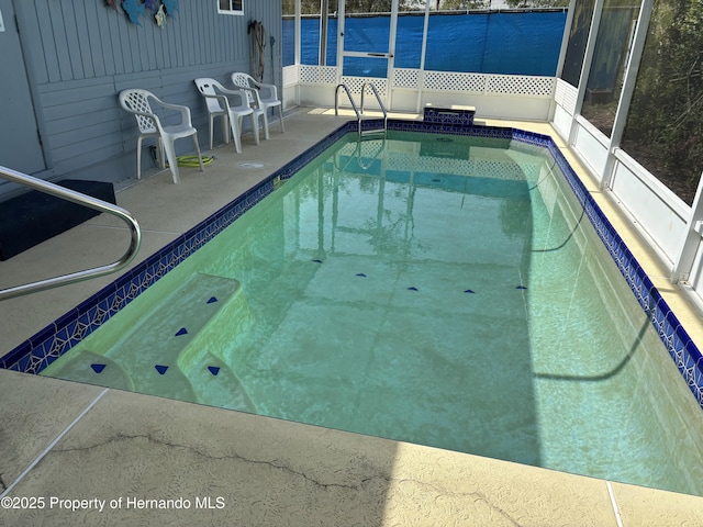 12325 Fairway Ave, Brooksville, FL 34613 - outdoor pool with a patio area and a lanai
