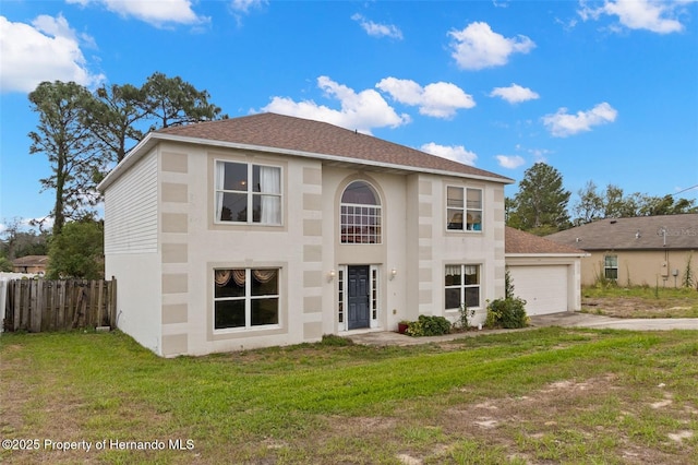 4148 Landover Blvd, Spring Hill, FL 34609 - view of front facade with concrete driveway, an attached garage, stucco siding, and a shingled roof