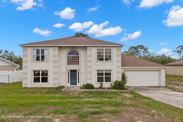 4148 Landover Blvd, Spring Hill, FL 34609 - view of front of home with a garage, driveway, stucco siding, and a shingled roof