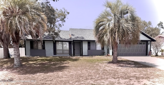 11087 Addison St, Spring Hill, FL 34609 - single story home featuring a garage, driveway, roof with shingles, and brick siding