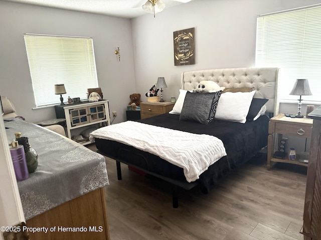 11087 Addison St, Spring Hill, FL 34609 - bedroom with wood finished floors