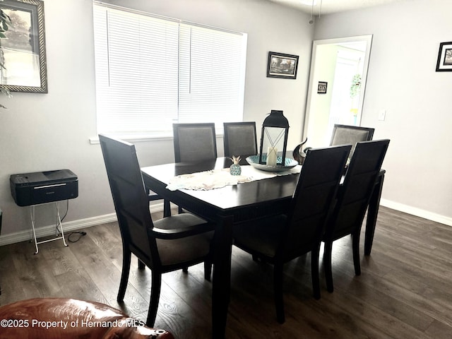 11087 Addison St, Spring Hill, FL 34609 - dining room featuring wood finished floors and baseboards