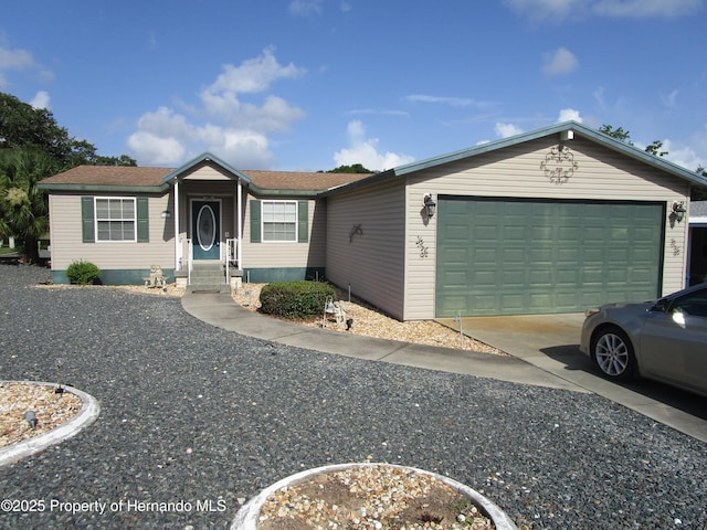 8423 Dickens Ave, Brooksville, FL 34613 - view of front of property with an attached garage and concrete driveway