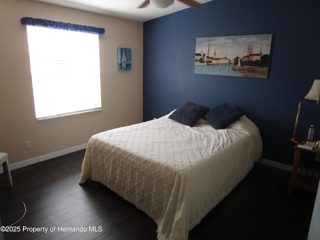 8423 Dickens Ave, Brooksville, FL 34613 - bedroom featuring multiple windows, wood finished floors, and ceiling fan