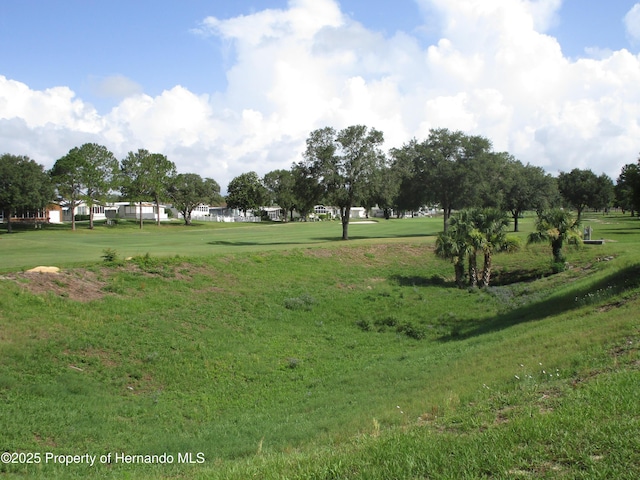 8423 Dickens Ave, Brooksville, FL 34613 - view of property's community with a lawn and golf course view