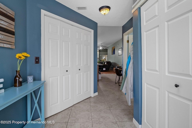 204 Oak Lake Dr, Spring Hill, FL 34608 - hall featuring light tile patterned floors