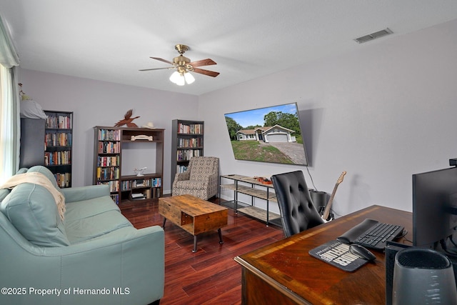 204 Oak Lake Dr, Spring Hill, FL 34608 - home office with dark wood-style flooring and ceiling fan