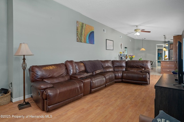 204 Oak Lake Dr, Spring Hill, FL 34608 - living area with light wood-style floors and ceiling fan