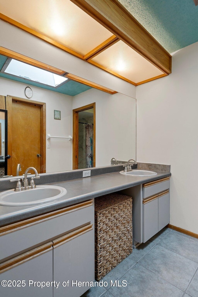 204 Oak Lake Dr, Spring Hill, FL 34608 - full bathroom with double vanity and a skylight