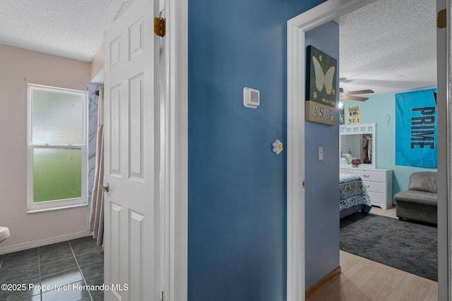 204 Oak Lake Dr, Spring Hill, FL 34608 - corridor with a textured ceiling