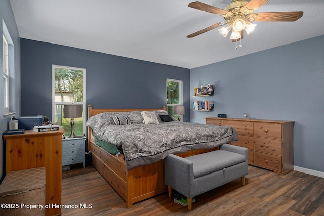 204 Oak Lake Dr, Spring Hill, FL 34608 - bedroom with wood finished floors and a ceiling fan