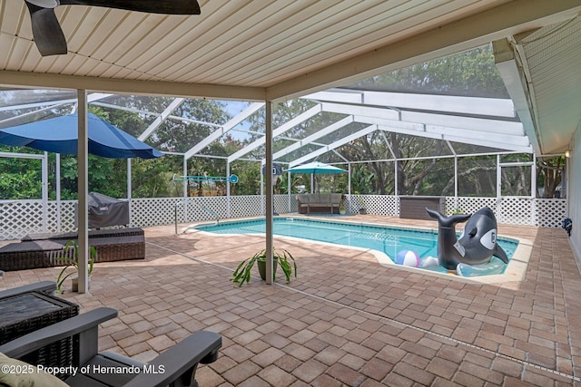 204 Oak Lake Dr, Spring Hill, FL 34608 - view of pool with a ceiling fan, a patio, glass enclosure, and an outdoor living space