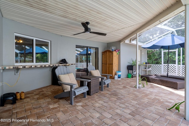 204 Oak Lake Dr, Spring Hill, FL 34608 - view of patio with ceiling fan and a lanai