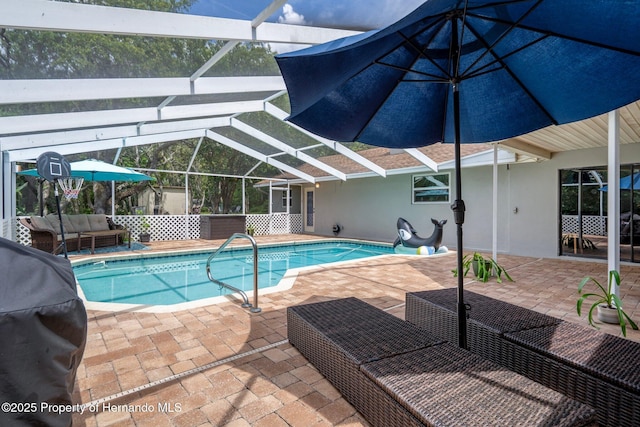 204 Oak Lake Dr, Spring Hill, FL 34608 - swimming pool with outdoor lounge area, a patio area, area for grilling, and a lanai