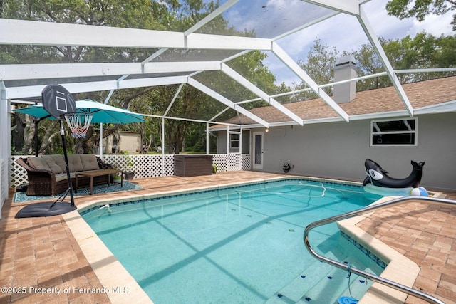 204 Oak Lake Dr, Spring Hill, FL 34608 - outdoor pool with an outdoor hangout area, a patio area, and glass enclosure