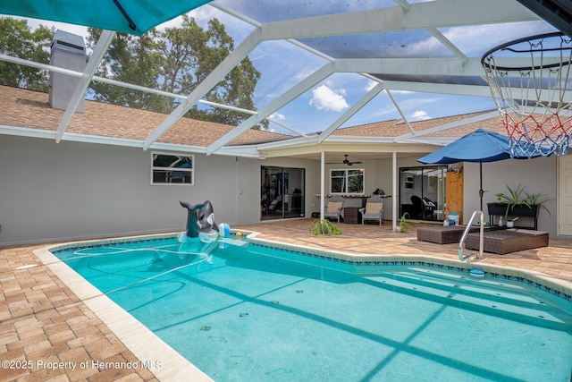 204 Oak Lake Dr, Spring Hill, FL 34608 - swimming pool featuring a patio, a ceiling fan, an outdoor hangout area, and a lanai