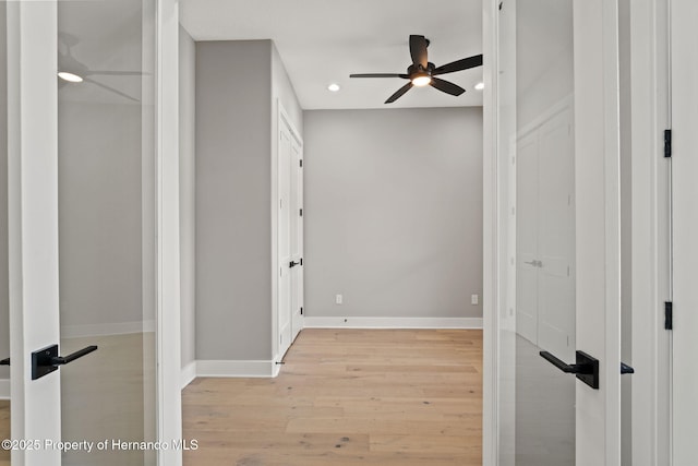 5018 Elm Leaf Dr, Brooksville, FL 34601 - hallway featuring light wood-type flooring and recessed lighting