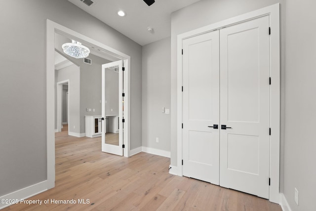 5018 Elm Leaf Dr, Brooksville, FL 34601 - hallway with light wood-style floors and recessed lighting