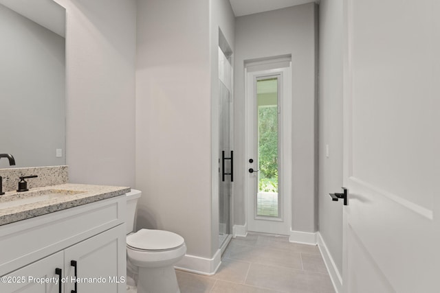 5018 Elm Leaf Dr, Brooksville, FL 34601 - bathroom with vanity, tile patterned floors, and a shower stall