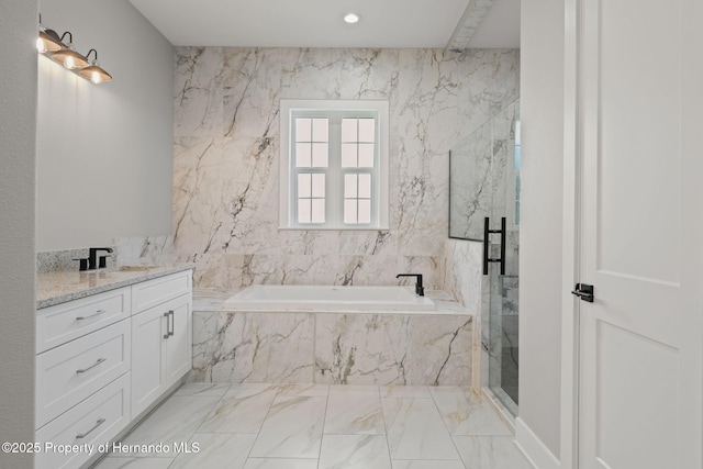 5018 Elm Leaf Dr, Brooksville, FL 34601 - full bathroom with marble tiled flooring, a bath, vanity, a marble finish shower, and recessed lighting
