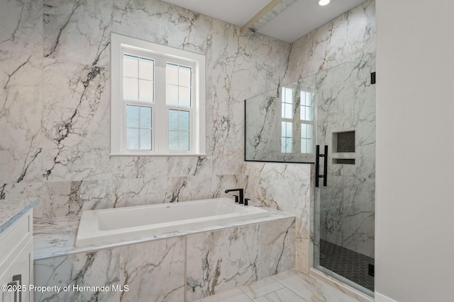5018 Elm Leaf Dr, Brooksville, FL 34601 - full bath with marble finish flooring, a bath, a marble finish shower, and vanity
