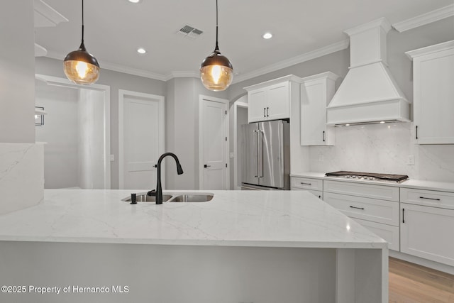 5018 Elm Leaf Dr, Brooksville, FL 34601 - kitchen featuring appliances with stainless steel finishes, custom exhaust hood, backsplash, recessed lighting, and white cabinetry