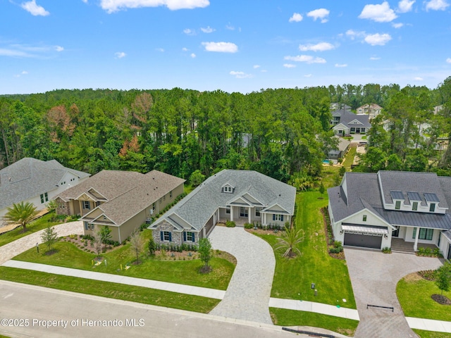 5018 Elm Leaf Dr, Brooksville, FL 34601 - aerial view of residential area featuring a heavily wooded area