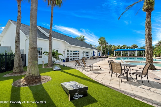 5018 Elm Leaf Dr, Brooksville, FL 34601 - exterior space featuring a community pool and a patio area