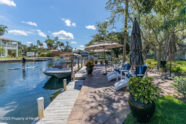 5233 Tuscawilla Dr, Weeki Wachee, FL 34607 - dock featuring a water view