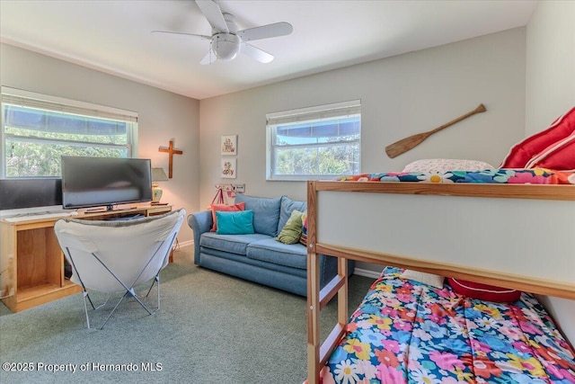 5233 Tuscawilla Dr, Weeki Wachee, FL 34607 - bedroom featuring multiple windows, carpet flooring, and ceiling fan