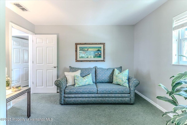 5233 Tuscawilla Dr, Weeki Wachee, FL 34607 - living room featuring carpet