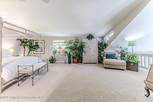 5233 Tuscawilla Dr, Weeki Wachee, FL 34607 - carpeted bedroom with multiple windows