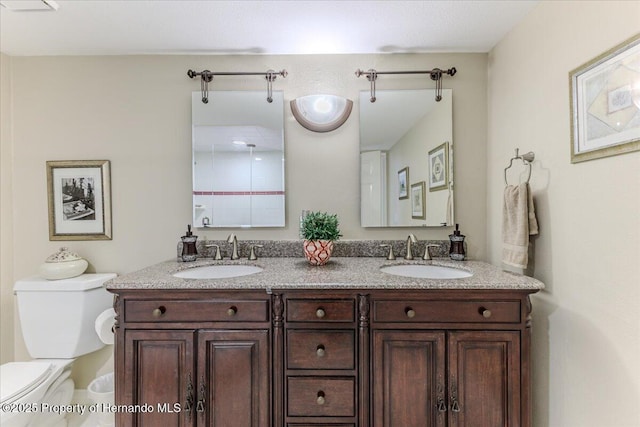 5233 Tuscawilla Dr, Weeki Wachee, FL 34607 - full bathroom with toilet and double vanity