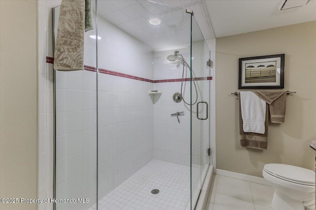5233 Tuscawilla Dr, Weeki Wachee, FL 34607 - bathroom with tile patterned floors and a stall shower