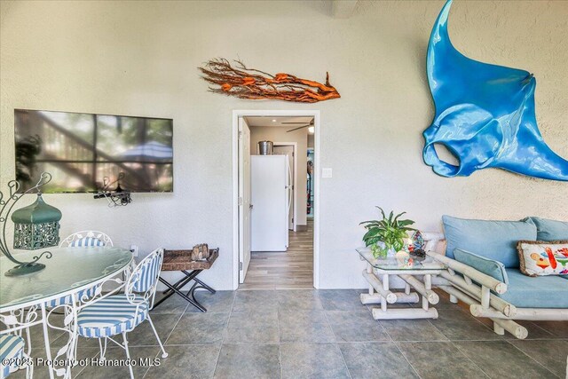 5233 Tuscawilla Dr, Weeki Wachee, FL 34607 - living area featuring tile patterned flooring