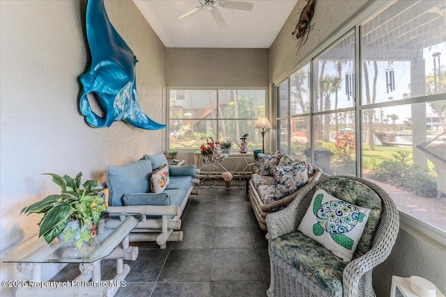 5233 Tuscawilla Dr, Weeki Wachee, FL 34607 - sunroom featuring ceiling fan and outdoor lounge area