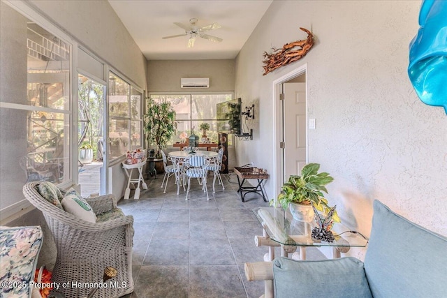 5233 Tuscawilla Dr, Weeki Wachee, FL 34607 - sunroom with ceiling fan, outdoor dining space, a textured wall, and tile patterned flooring