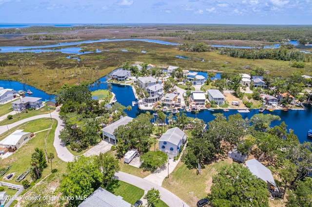 5233 Tuscawilla Dr, Weeki Wachee, FL 34607 - aerial perspective of suburban area with a nearby body of water